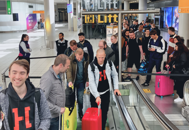 The team arriving together at the airport